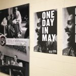 One Day in May posters hanging on wall